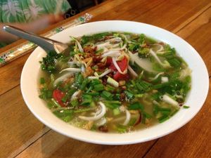 Yellow noodle soup with veggies at LaungXaiKham Restaurant in Vang Vieng