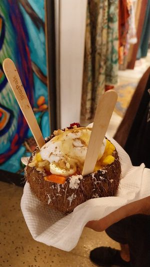 Coconut fruit bowl (with vegan yogurt 😍) at Rusty Farmer Market in Cairns