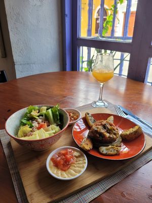 vegan falafel plate with juice at Oh La La in Cartagena