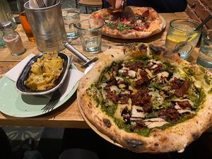 The one with pesto pizza with roasted garlic and herb potatoes  at Purezza Camden in London