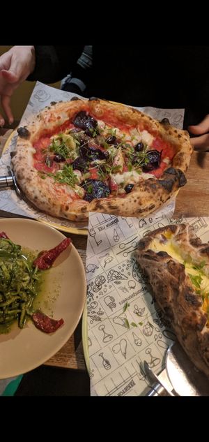 Pesto courgetti spaghetti, calzone, pizza at Purezza Camden in London