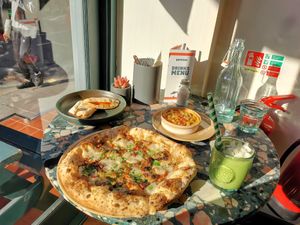 Truffle pizza, salmon ciabatta, mac and cheese, green smoothie at Purezza Camden in London