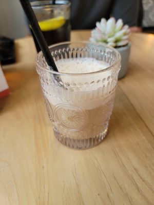Iced chai tea latte with oat milk at Purezza Camden in London