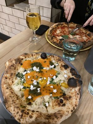 Salmon pizza (front), margherita pizza (back)    at Purezza Camden in London