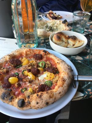 Four seasons pizza, nduja pizza, dough balls and garlic bread. All incredible   at Purezza Camden in London