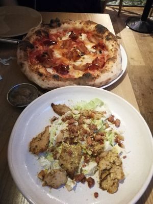 4 cheese pizza and Caesar salad at Purezza Camden in London