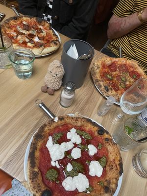 Four cheese (top left), Pepperoni & agave (top right) and Pesto (bottom)   at Purezza Camden in London
