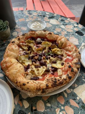 “Four seasons” pizza with garlic dip  at Purezza Camden in London