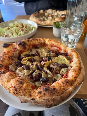 Four. Seasons pizza with extra vegan pancetta at Purezza Camden in London