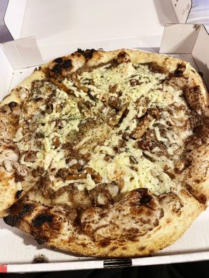 Black truffle pizza on wholemeal base at Purezza Camden in London