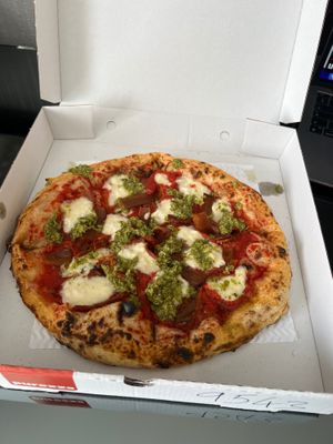 Pesto pizza with extra vegan bacon. Delish, thanks Deliveroo 💚🌱 at Purezza Camden in London