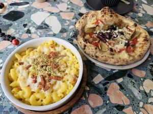 Mac and cheese and 7 inch four seasons pizza at Purezza Camden in London