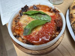 Aubergine parmigiana   at Purezza Camden in London