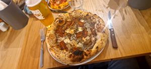 Black truffle pizza with vegan pancetta. 😋 at Purezza Camden in London