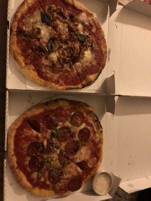 Deliveroo orders to bring purezza deliciousness home. Parmigiana and pepperoni.   at Purezza Camden in London