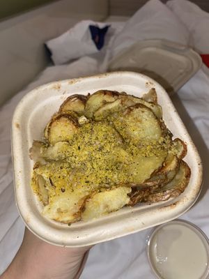 These are one of my absolute favourite things to eat! Cheesy herby potatoes 😍😍😍  at Purezza Camden in London