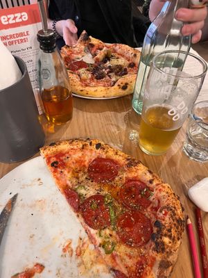 pepperoni pizza + partner’s pizza with mushrooms at Purezza Camden in London