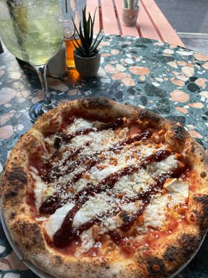 Four cheese pizza and limoncello spritz   at Purezza Camden in London