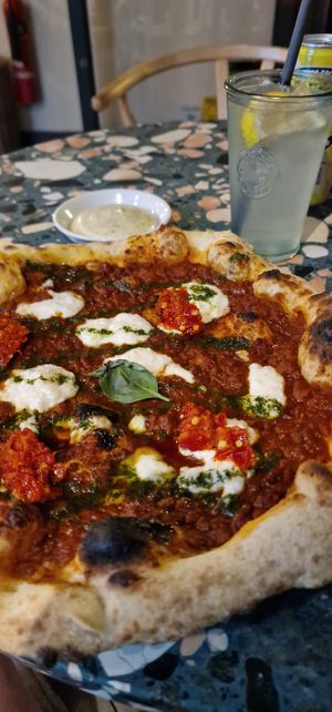 Lasagne piccante pizza with basil mayo. at Purezza Camden in London