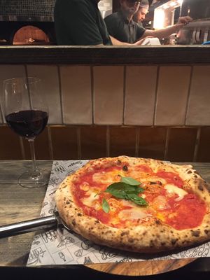 pizza, wine and the view when seated at the „bar" at Purezza Camden in London