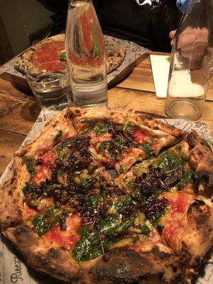 Pesto Manifesto in front, Marinara on back at Purezza Camden in London