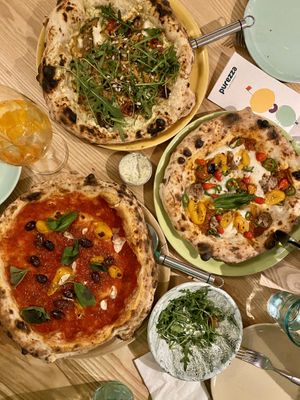The one with the tomatoes, the Nduja one and special of the month at Purezza Camden in London