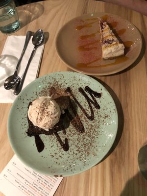 Salted Caramel Brownie with Vanilla ice cream and strawberry cheesecake with mango coulis at Purezza Camden in London