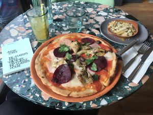 The Season pizza, mac and cheese, and the a Ginger Amaretto cocktail. All good. at Purezza Camden in London