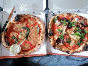 Left: Margherita with smoked mozzarella, Right : all the seasons pizza at Purezza Camden in London