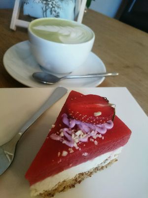 strawberry-coconut cake and matcha almond latte at Craft Cafe in Kyiv