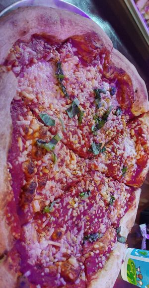 Pizza with follow your heart cheese, basil, and garlic. at Mellow Mushroom in Lima