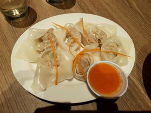 yummy dumplings with the surprisingly tasty sauce made of bell peppers    at Genesis 创世界素食馆 in Central Singapore