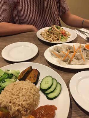 Three different dishes at Genesis 创世界素食馆 in Central Singapore