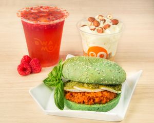 Menu bwaburger : toasted green bread with basil pesto sauce, goat cheese-honey and tomato caviar + hazelnut mousse w/ whipped cream. My vegan friend chose the same dish without goat cheese and a fruit salad with passion fruit sauce + a kombucha. Excellent ! Hibiscus tea with rasberry fabulous too. at BWAMOA in Toulouse