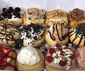Variations of cinnamon rolls and their toppings at Cinnaholic in Westlake