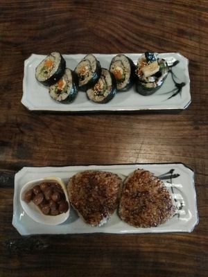 sushi roll & grilled rice balls with peanuts in a sauce at Itadakizen in Kyoto