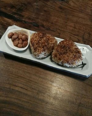 grilled rice balls with peanuts in a sauce at Itadakizen in Kyoto