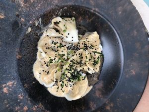 Raviolis de Beyond meat con tufa y foie at Hakuna Matata Veggie in Madrid