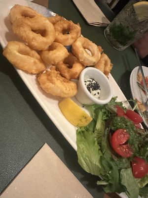 Calamari with sauce and salad   at Hakuna Matata Veggie in Madrid