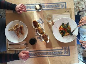 Delicious vegan food: patatas bravas, croquetas and pastela.  at Hakuna Matata Veggie in Madrid