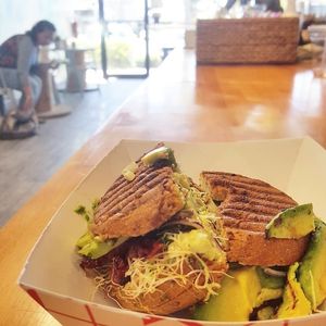 Vegan + Sprouts Sandwich on a Gluten Free Bagel at Jaya Nutrition Bar in Juno Beach