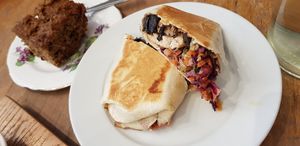 Warm toasted wrap with miso baked tofu, peanut butter,  sweet smokey mushrooms and slaw filling. A winning combo! 👍 at The Wildcat in Fort William