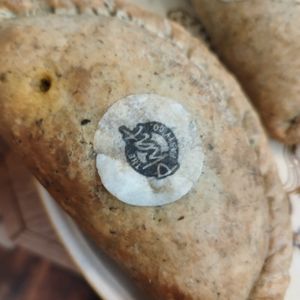 Cauliflower curry pastry I got to go, as well as what I ate at the restaurant. Was delicious four hours later! at The Wildcat in Fort William