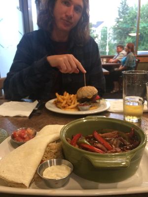 Me unimpressed i have to wait for the oicture before i eat. That burger though... at Ek's Grill in Kelowna