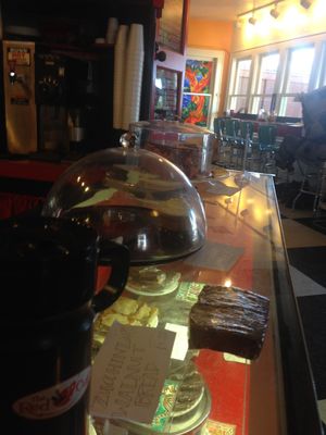 Front counter with baked goods of the day on display at Red Cup Coffee House in Oklahoma City