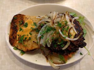 veggie burger with house made vegan cheese at Red Cup Coffee House in Oklahoma City