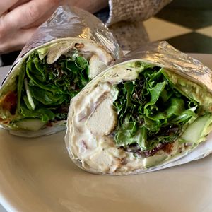 Avocado Wrap. The coconut bacon gives it a great crunch and the vegan garlic aioli is amazing! at Red Cup Coffee House in Oklahoma City