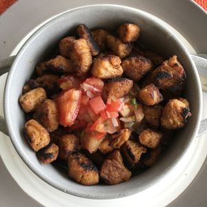 Veggiefrijo - tofu chicharron, kidney beans, rice, pico de gallo at Palmeadas in San Pedro