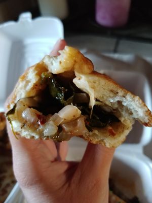 Spinach Pie: The bread was nice and I liked the onion and spinach. Not sure how I feel about the red pepper flakes added. I think the flavor was a bit off for me. at Aladdin Restaurant in Allentown