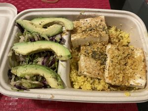 Great vegan  box with cauliflower rice, tofu, avocado and salad   at Kale in Hong Kong Island
